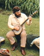 Alex Demas plays the banjo
